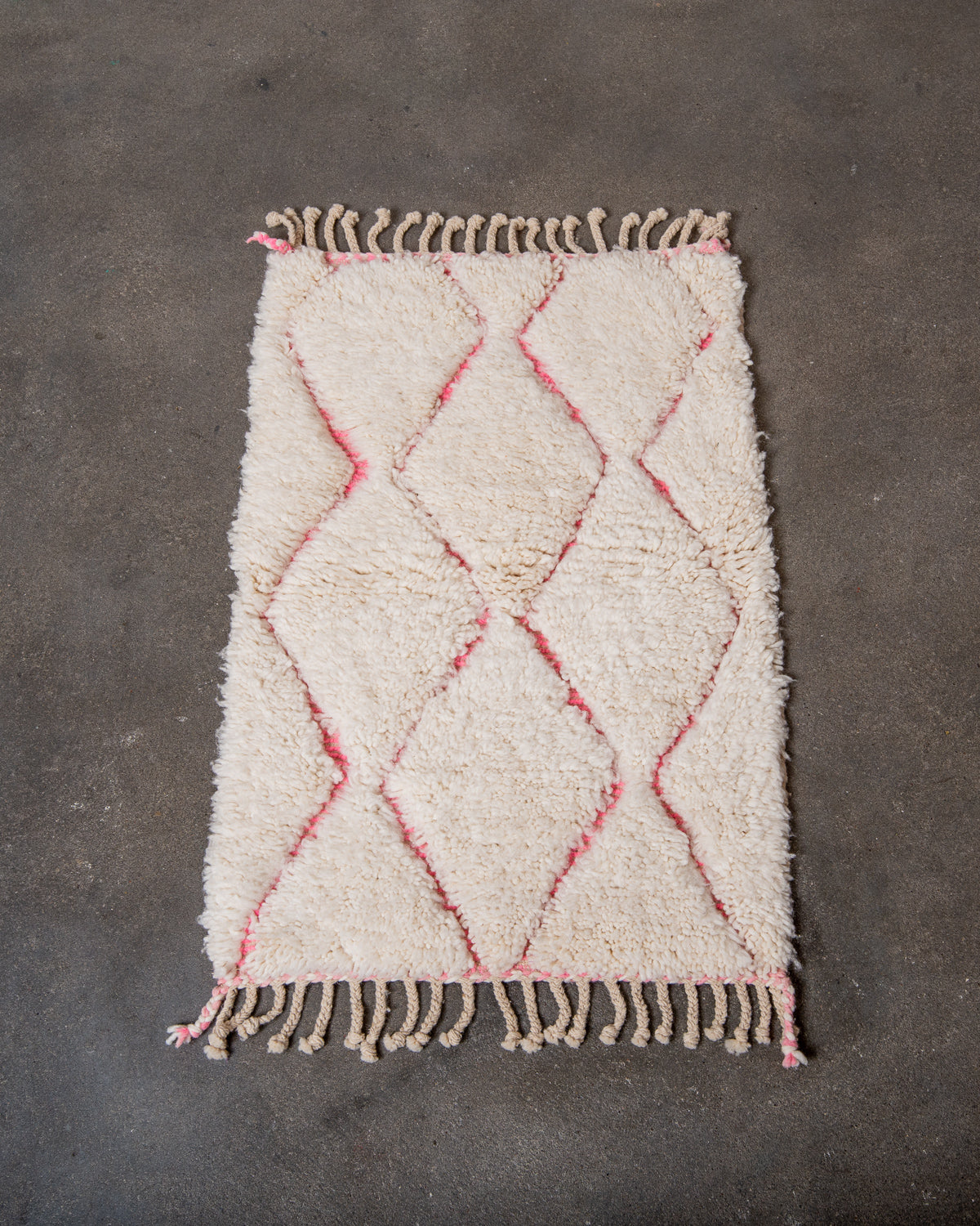 Modern, designer, handcrafted Berber rug from Morocco. Beniourain carpet with beautiful colours and patterns and fluffy wool texture.
